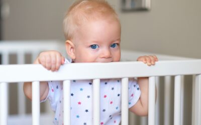 My baby stands (or sits up) in the crib and won’t sleep!