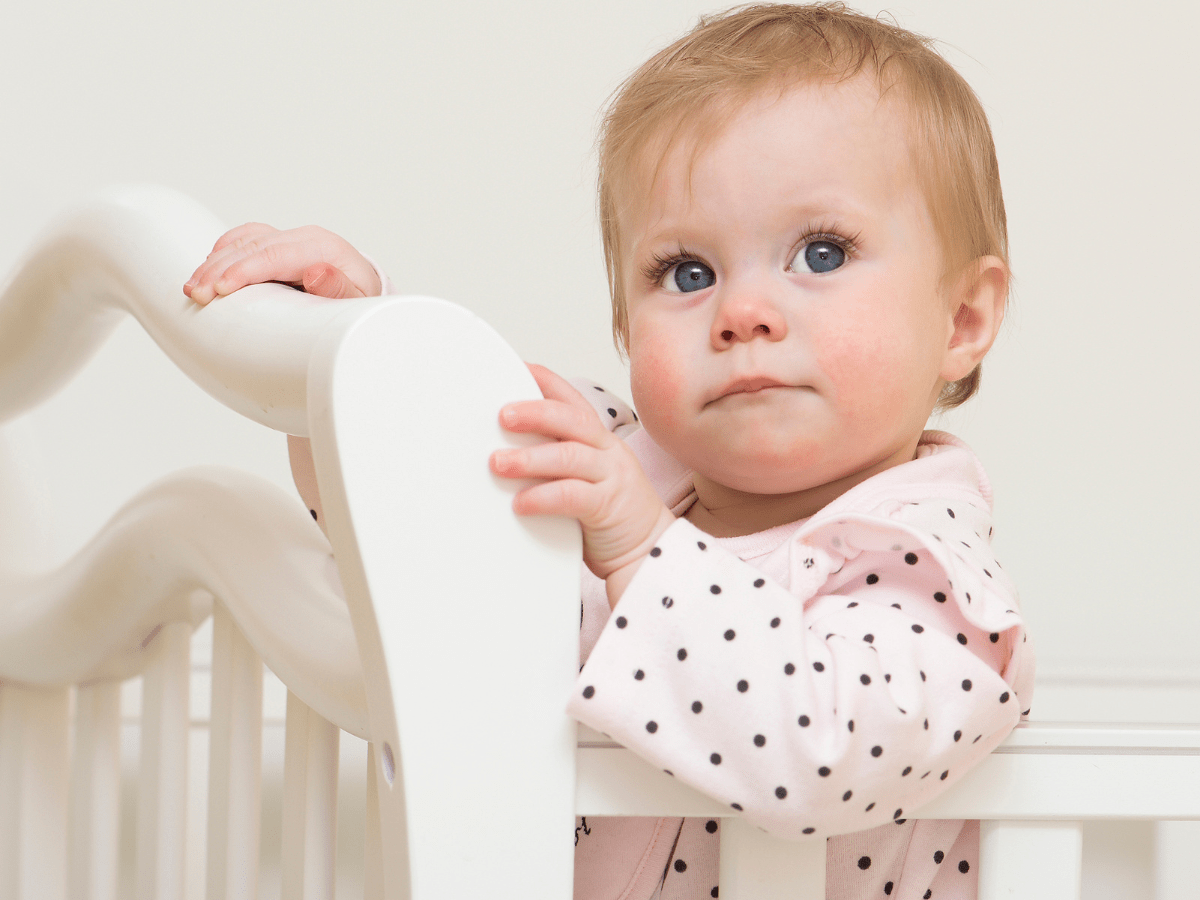 cute baby in crib on 2 nap routine